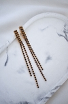 aros strass negro y dorado