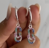 argollas acero blanco y ganchito de colores