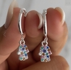 argollas de acero blanco y mano de fatima
