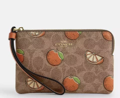 Corner Zip Wristlet In Signature Canvas With Orange Print - comprar en línea