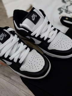 Tenis feminino / masculino preto e branco na internet