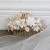 Pente em Base Dourada com Flores de Porcelana Fria e Strass - Witney - comprar online
