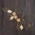 Pente triple Flower com Flores Douradas - Antonia - comprar online
