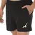 Shorts Mizuno High pretos com design leve e bolso lateral.
