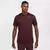 Camiseta Nike Dri-FIT Legend na cor vinho, modelo masculino, com logo da Nike no peito.