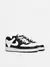 Tênis Nike Court Vision Low nas cores preto e branco, com detalhes em couro e sola branca.