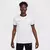 Camiseta branca Nike Dri-FIT Academy 25 com detalhe em preto e logo da marca.