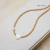 Choker Miçangas com Coração de Madrepérola Banhada a Ouro. - comprar online