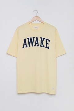 Remera AWAKE amarilla btk - comprar online