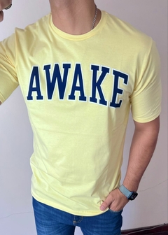 Remera AWAKE amarilla btk en internet