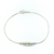 Pulsera con bolitas y dijes combinados en internet
