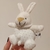 Conejitos Benjamines de Plush - Tonos neutros en internet