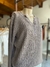 Sweater cruzado brillos