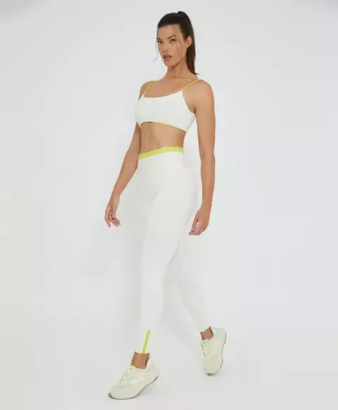 Legging com bolso e zíper na barra nude Alto Giro
