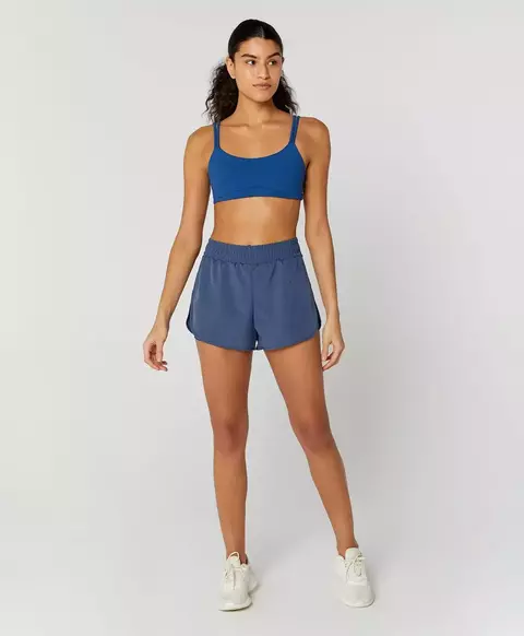 Short sobreposto eterno abertura lateral azul meia noite Alto Giro