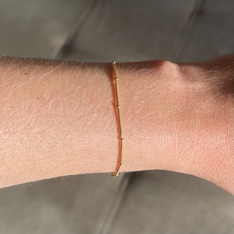 PULSEIRA RABO DE RATO BOLINHA BANHADA A OURO