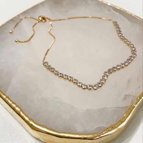 PULSEIRA AJUSTÁVEL RIVIERA CHATON 2MM CRISTAL BANHADA A OURO