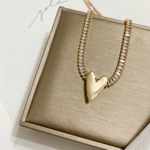 PINGENTE CORAÇÃO PONTIAGUDO LISO PASSANTE BANHADO A OURO