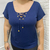 Imagem do Blusa decote cadarço ilhós soltinha manga curta plus size
