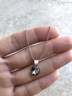 Dije cristal negro