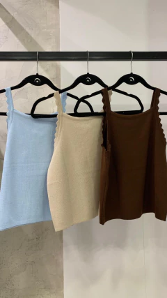 MUSCULOSA TEJIDA VOLADO