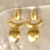 Brinco com Pingente de elos oval Banhadoem ouro 18k
