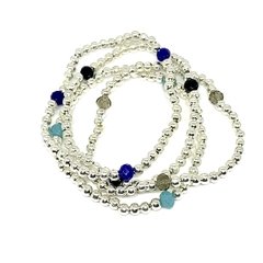 Pulsera plateada con cristales facetados