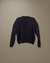 Sweater Benson color negro con diseño de trenzas y cuello redondo, doble hilado, simil bremer con lycra.