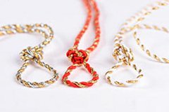 CORDON METALICO BICOLOR DORADO Y ROJO X METRO