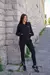Pantalón chupin con cierre inferior y detalle de cuero y tachas - comprar online