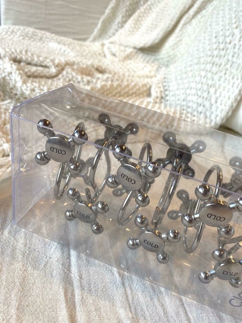 gancho "canilla" para cortina de baño