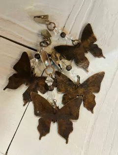 pesa mantel mariposa bronce x4 - comprar online