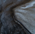 MANTA DE PIEL SIMIL CONEJO COLOR GRIS OSCURO en internet