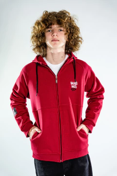 CAMPERA RANGLAN CON RECORTE Y BORDADO