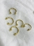 Piercings dorados en internet