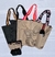 Bolso impermeable negro, gold stripes - tienda online