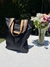 Bolso impermeable negro, gold stripes