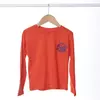 remera basic roja logo