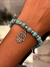 Pulsera esfera de turquesa reconstituida con dije de mano de fatima - comprar online