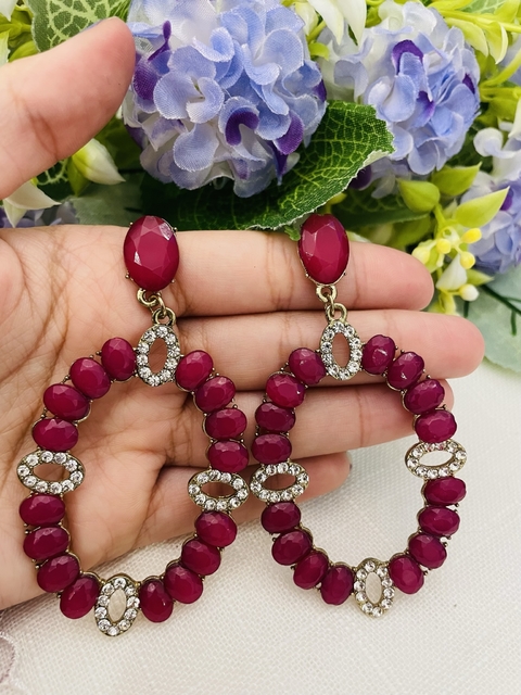 Aros de strass fucsia mate engarce dorado