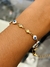 Pulsera de acero quirúrgico dorado con corazón y ojo turco blanco - comprar online