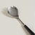 Cuchara dentada de acero inoxidable y mango de cerámica negro - Gabriela Noto Home & Deco