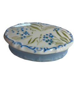 Caixinha oval verde e azul na internet