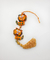 Mini Penduricalho Shisa de feltro laranja na internet