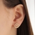 Brinco redondo com detalhe central de cruz cravejado 12mm banhado a ouro 18k - comprar online