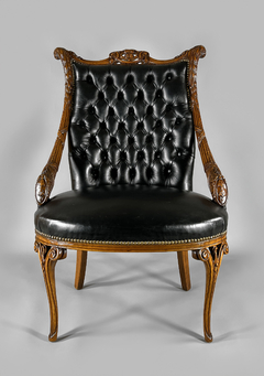 Sillón Alemán en madera de roble y cuero. Siglo XIX