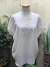 Blusa con apliques talle M