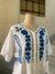 Camisola blanca con bordados en internet