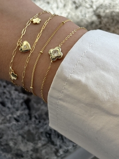 Pulsera flor dore en internet