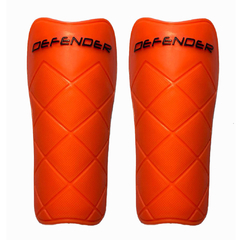 PAR CANILLERA DEFENDER NARANJA (05C00655)